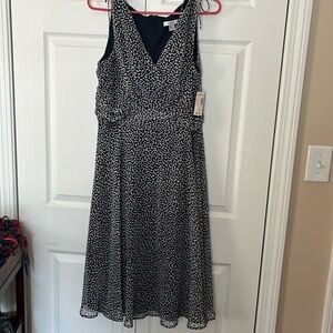 Navy dotted empire waist v-neck dress.